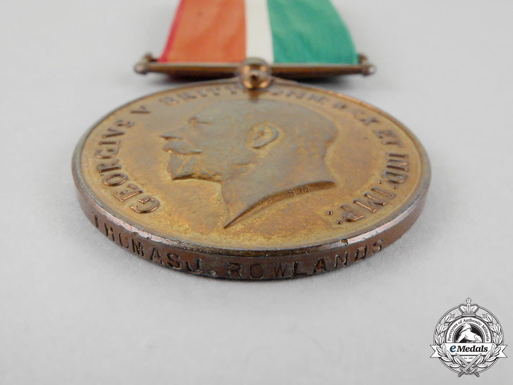 a_british_mercantile_marine_war_medal_with_packet_of_issue,_to_thomas_j._rowlands_l_714_1