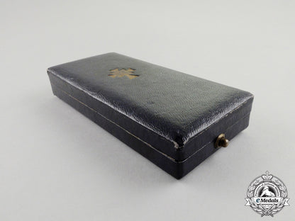 a_cased_gold_grade_mother’s_cross_with_instructions_for_wear_m17-000077