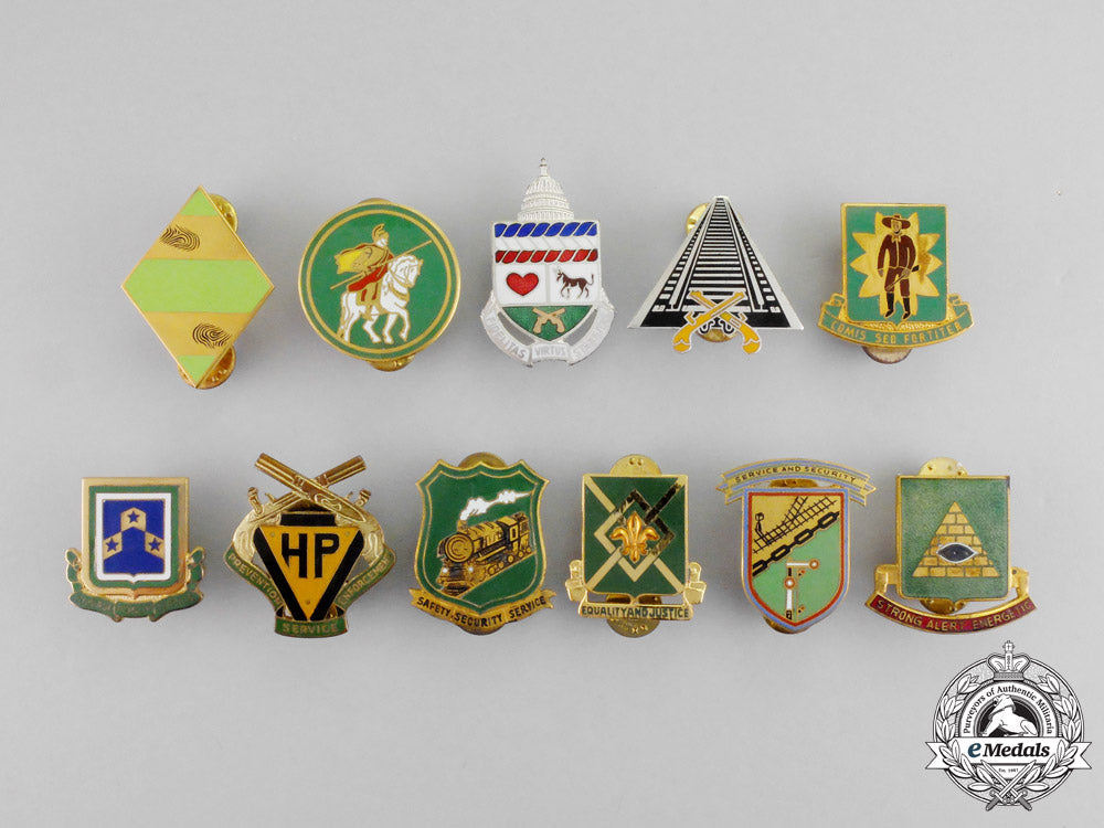 united_states._eleven_military_police_badges_m17-000201