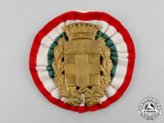 Italy, Kingdom. A Pith Helmet Badge