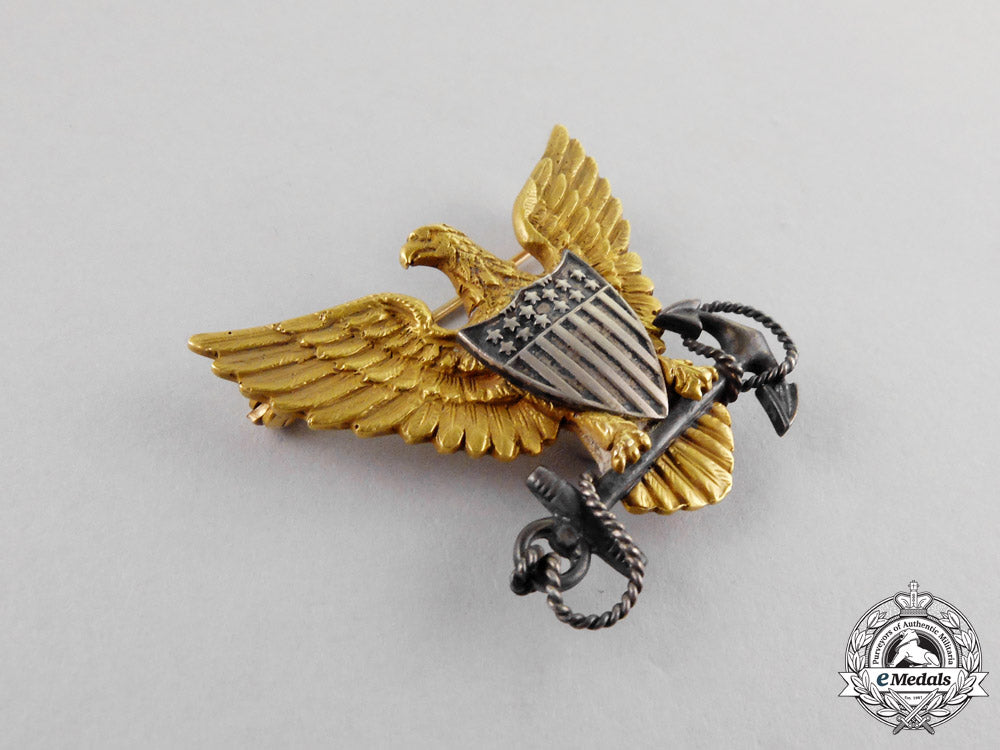 united_states._a_superb_coast_guard_officer's_cap_badge_in_gold_m17-1665