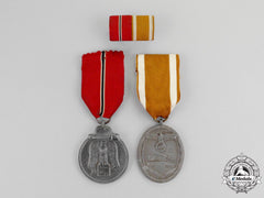 Germany. An Ek2 & Westwall Medal Pair With Ribbon Bar
