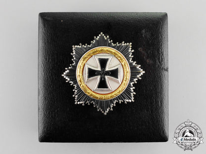 germany._a(_dkig)_german_cross_in_gold_in_case;_early_first_issue1957_version_m17-3040
