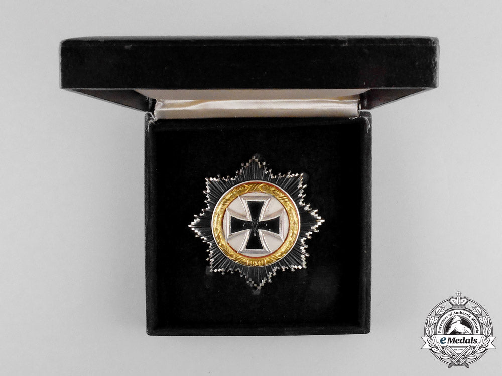 germany._a(_dkig)_german_cross_in_gold_in_case;_early_first_issue1957_version_m17-3048