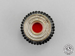 Germany. A Third Reich Period Metal Tri-Colour Cap Cockade