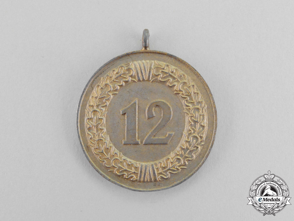 germany._a_second_war_period_wehrmacht_heer(_army)12_year_long_service_medal_m17-401_1_1