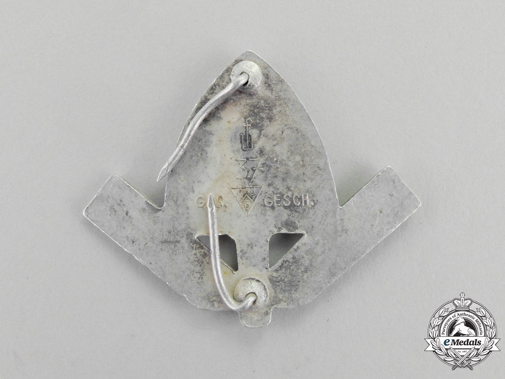 germany._an_rad(_national_labour_service)_cap_badge_by_f._w._müller_m17-576