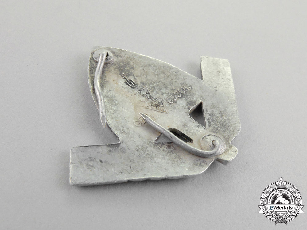 germany._an_rad(_national_labour_service)_cap_badge_by_f._w._müller_m17-577