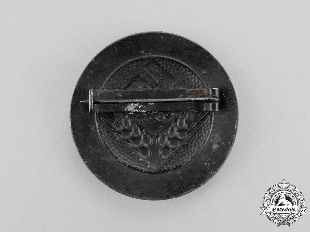 germany._a_radwj(_reich_labour_service_of_female_youths)“_arbeitsmaid”_rank_badge_m17-580