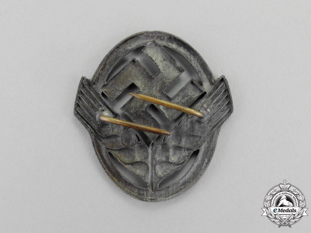 germany._a_rad(_reich_labour_service)_cap_badge_m17-583
