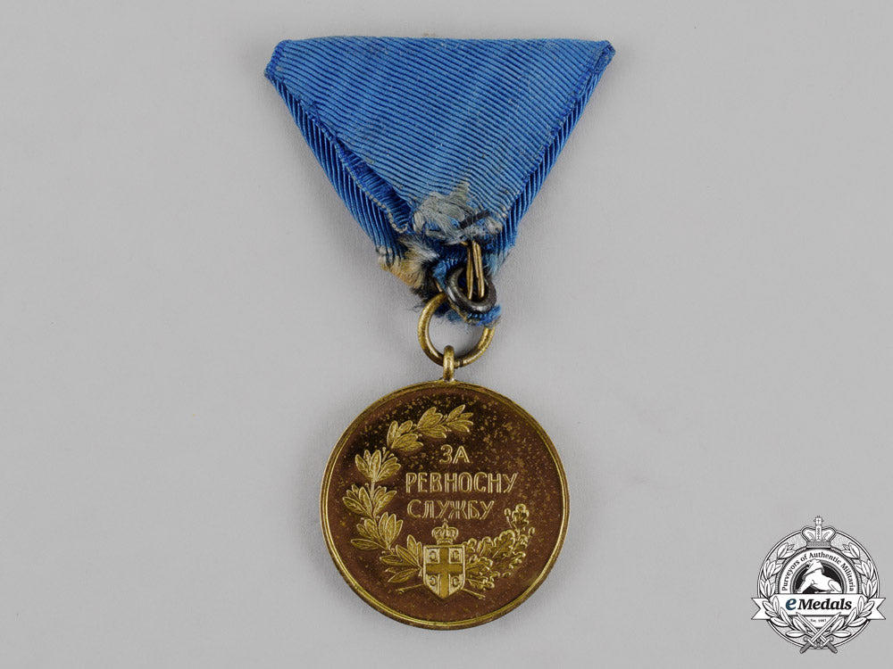 serbia,_kingdom._a_medal_for_zeal,_gold_grade,_type_ii_with_a_single_crown_between_the_eagles'_heads_m18-1510