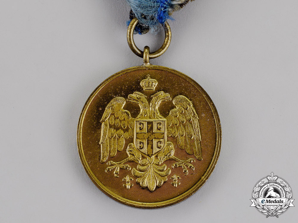 serbia,_kingdom._a_medal_for_zeal,_gold_grade,_type_ii_with_a_single_crown_between_the_eagles'_heads_m18-1511