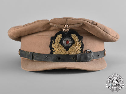 germany._a_kriegsmarine_nco’s_tropical_visor_cap_with_a_photograph_of_the_cap_being_worn_m18-2213