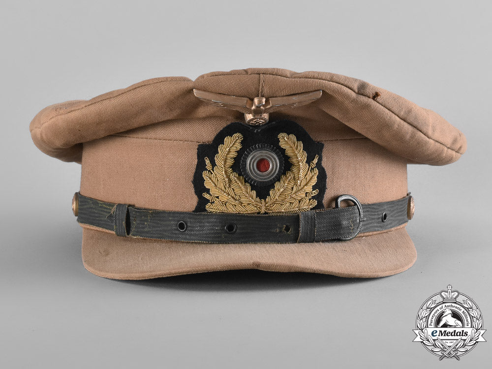 germany._a_kriegsmarine_nco’s_tropical_visor_cap_with_a_photograph_of_the_cap_being_worn_m18-2213