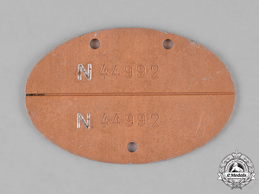 germany,_kriegsmarine._an_identification_tag_accompanied_by_the_picture_of_a_sailor_m181_1711