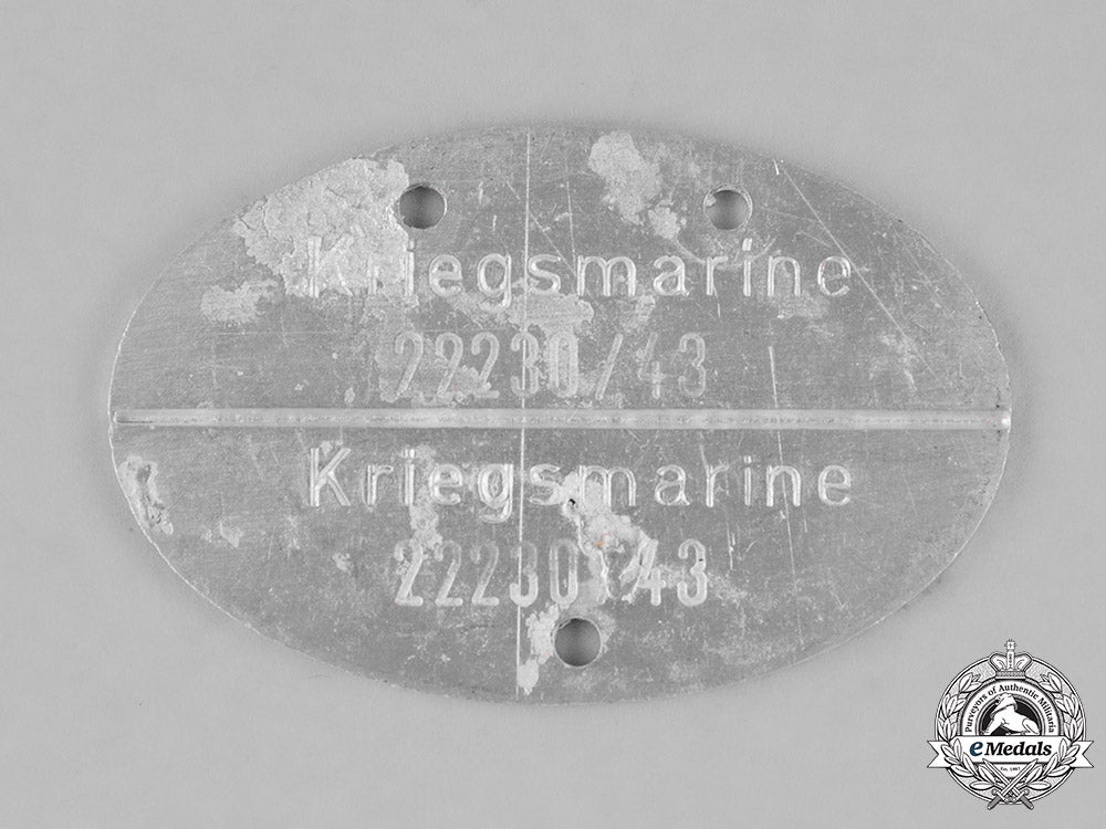 germany,_kriegsmarine._an_identification_tag_accompanied_by_the_picture_of_a_sailor_m181_1716