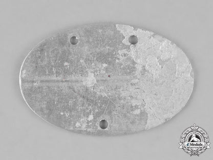 germany,_kriegsmarine._an_identification_tag_accompanied_by_the_picture_of_a_sailor_m181_1717