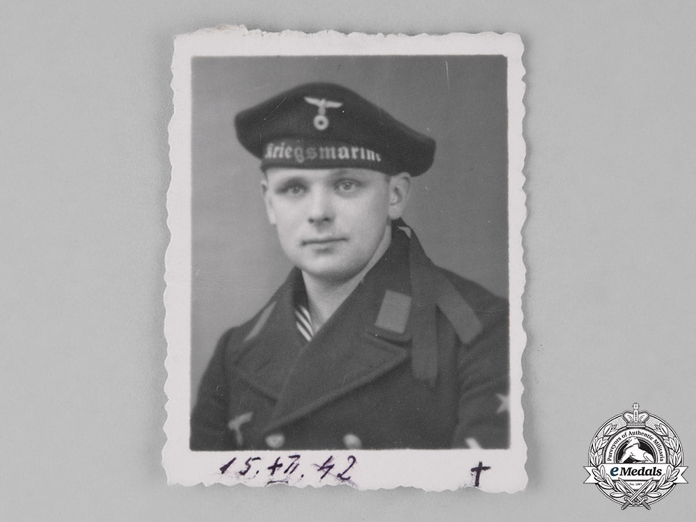 germany,_kriegsmarine._an_identification_tag_accompanied_by_the_picture_of_a_sailor_m181_1718