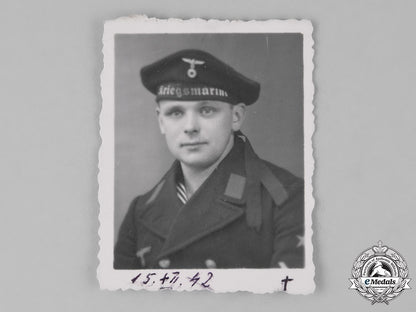 germany,_kriegsmarine._an_identification_tag_accompanied_by_the_picture_of_a_sailor_m181_1718