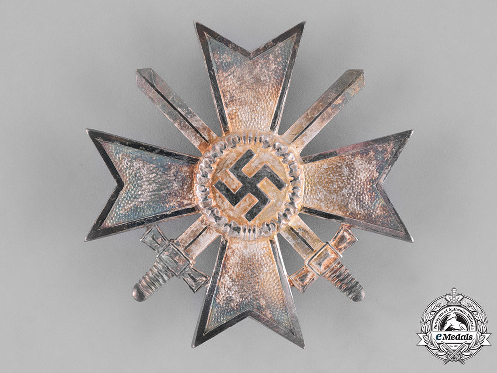 germany,_wehrmacht._a_mint_cased_war_merit_cross_first_class_with_swords,_by_deschler&_sohn_m181_2502