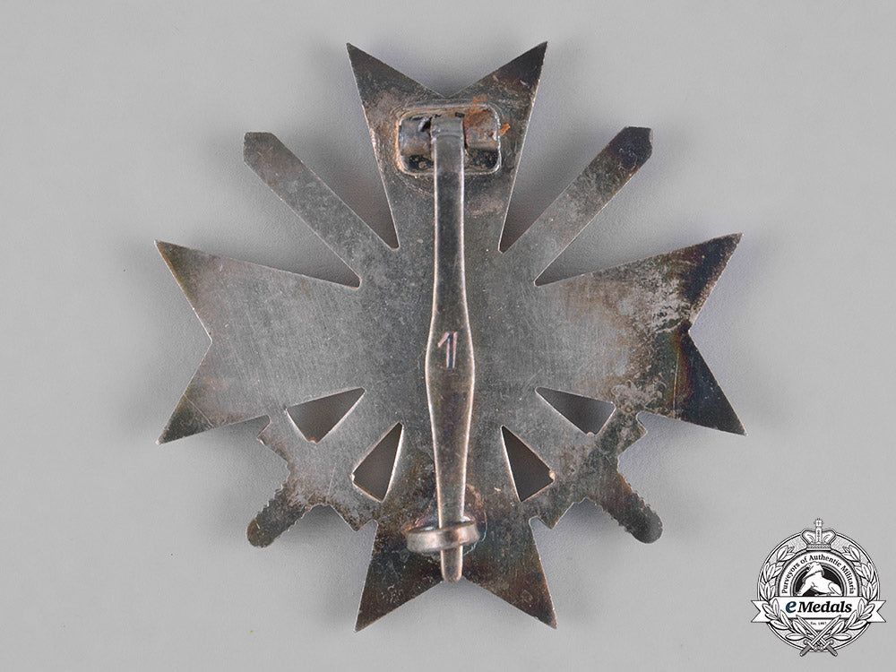 germany,_wehrmacht._a_mint_cased_war_merit_cross_first_class_with_swords,_by_deschler&_sohn_m181_2503