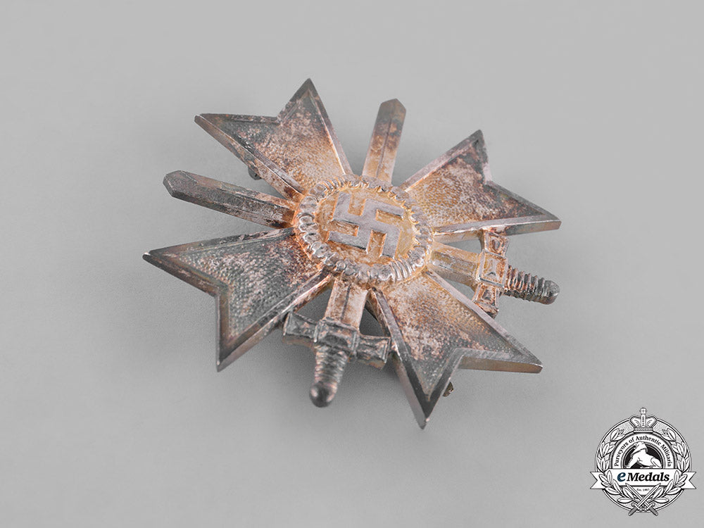 germany,_wehrmacht._a_mint_cased_war_merit_cross_first_class_with_swords,_by_deschler&_sohn_m181_2504