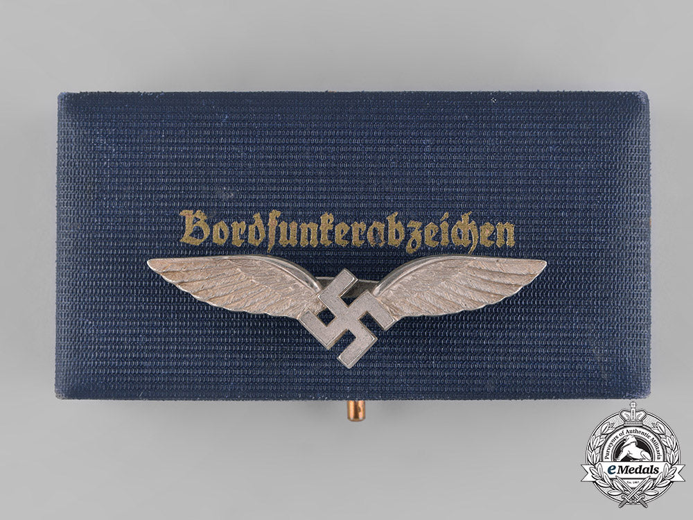 germany,_luftwaffe._a_cased_civilian_radio_operator_badge,_by_c.e._juncker_m181_2514
