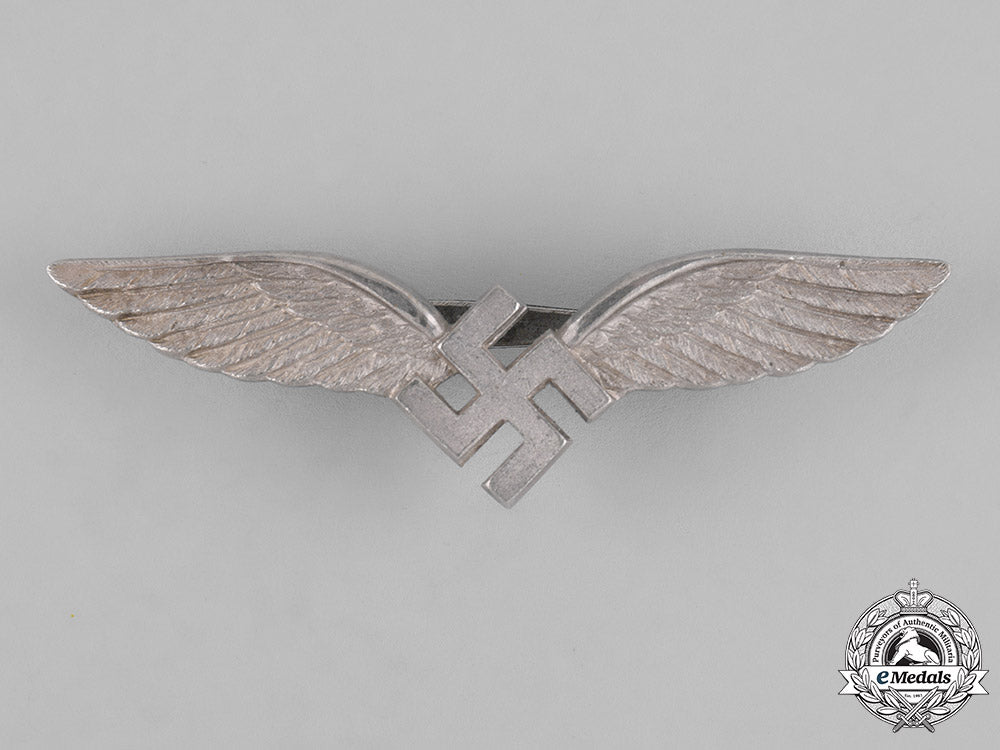 germany,_luftwaffe._a_cased_civilian_radio_operator_badge,_by_c.e._juncker_m181_2515
