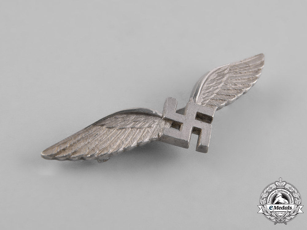germany,_luftwaffe._a_cased_civilian_radio_operator_badge,_by_c.e._juncker_m181_2517