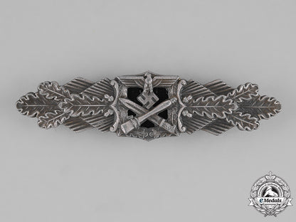 germany,_wehrmacht._a_wehrmacht_close_combat_clasp,_silver_grade,_by_c._e._juncker,_type1.13.1_m181_2539