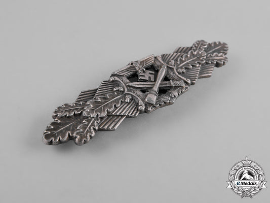 germany,_wehrmacht._a_wehrmacht_close_combat_clasp,_silver_grade,_by_c._e._juncker,_type1.13.1_m181_2541