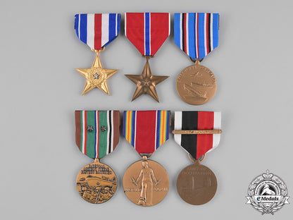 united_states._a_silver&_bronze_star_group_to_private_chilstedt,_kia_at_moncourt_woods,_october1944_m181_3069_2_1_1