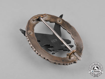 germany,_luftwaffe._a_cased_radio_operator_badge,"_thin_wreath",_by_c.e._juncker,_c.1937_m181_4167