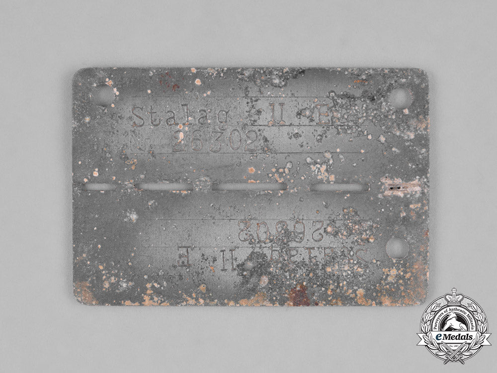 germany,_third_reich._a_stalag_ii-_e(_schwerin)_identification_tag,_numbered26302_m181_5015