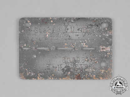 germany,_third_reich._a_stalag_ii-_e(_schwerin)_identification_tag,_numbered26302_m181_5015