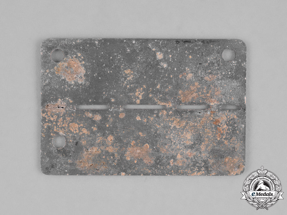 germany,_third_reich._a_stalag_ii-_e(_schwerin)_identification_tag,_numbered26302_m181_5016