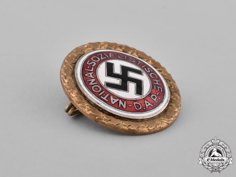 germany,_nsdap._a_golden_party_badge_to_robert_benda,_c.1934_m181_5060