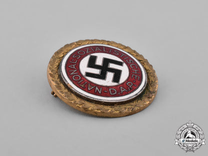 germany,_nsdap._a_golden_party_badge_awarded_to_otto_rick,_by_deschler&_sohn_m181_5066