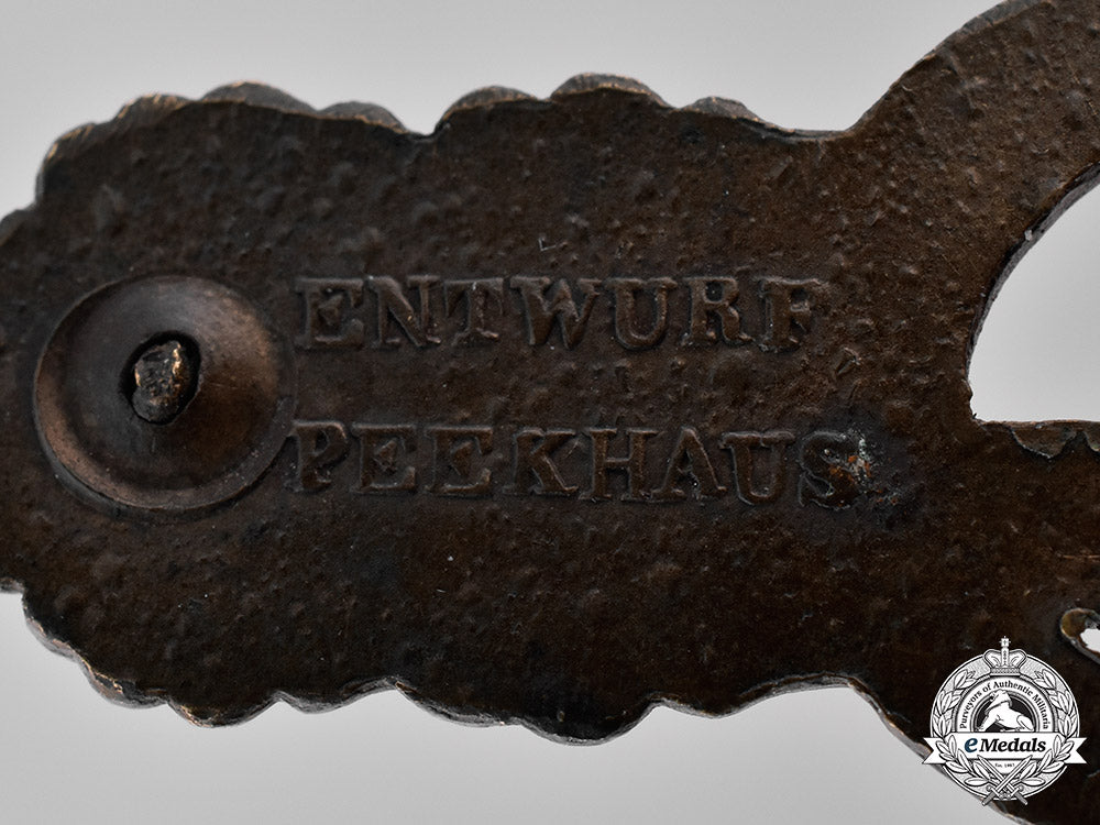 germany,_kriegsmarine._a_bronze_grade_u-_boat_combat_clasp,_second_pattern,_by_schwerin&_sohn_m181_5476_1_1