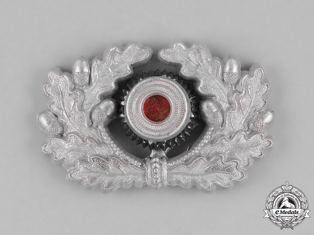 germany,_heer._an_army_nco’s_visor_cap_wreath_and_cockade_by_deschler&_söhn_m181_5857