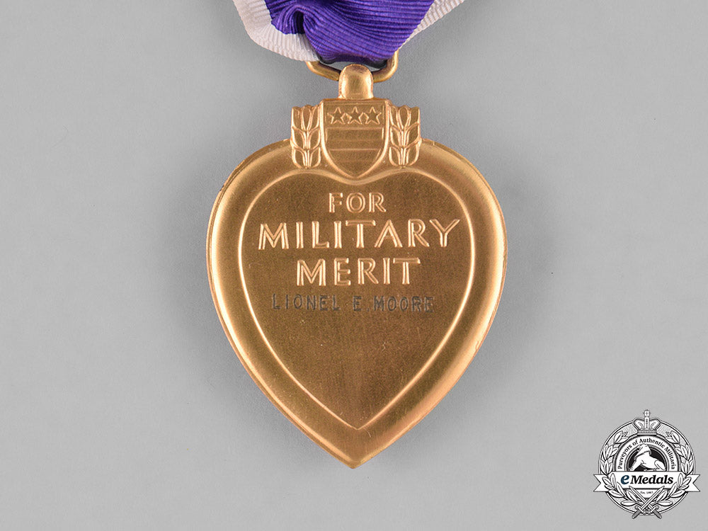 united_states._a_purple_heart_to_technician_moore,635_th_tank_destroyer_battalion,_battle_of_the_bulge_dow_m181_5971