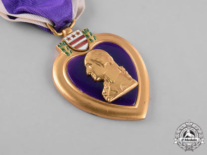 united_states._a_purple_heart_to_technician_moore,635_th_tank_destroyer_battalion,_battle_of_the_bulge_dow_m181_5972