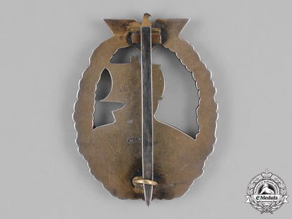 germany,_kriegsmarine._a_japanese-_made_auxiliary_cruiser_badge_of_oberbootsmann_karlheinz_cares_m181_7246
