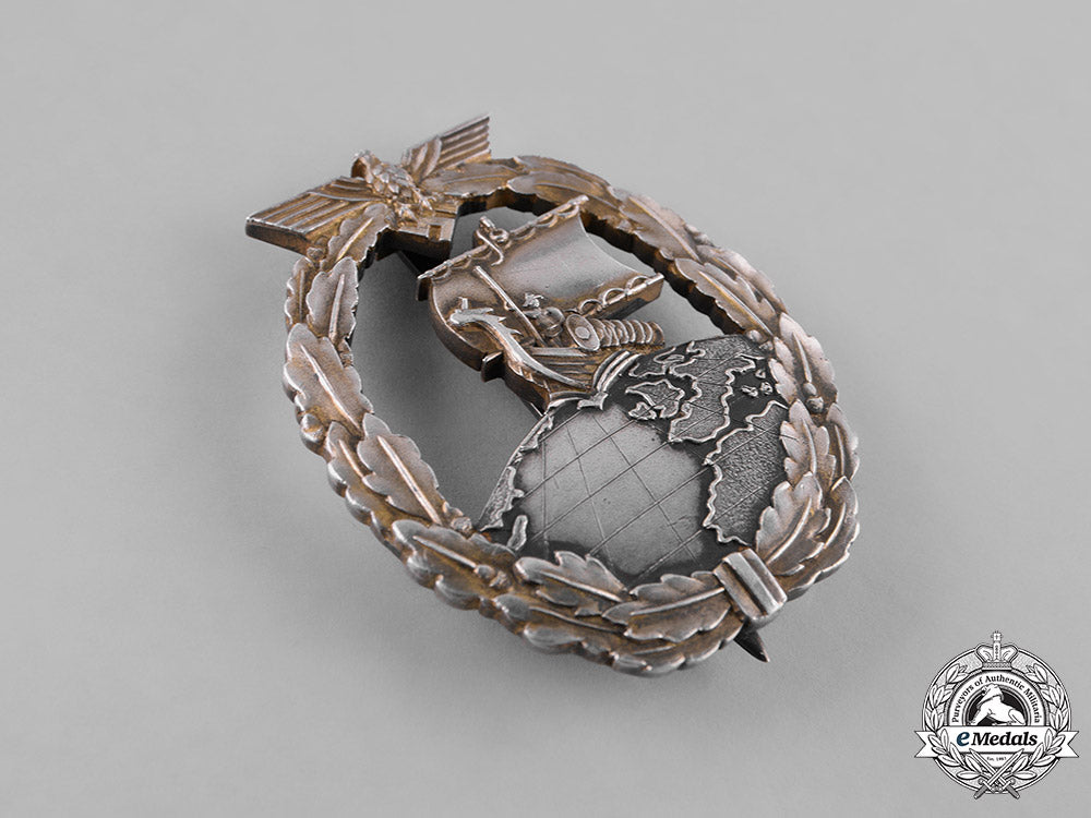 germany,_kriegsmarine._a_japanese-_made_auxiliary_cruiser_badge_of_oberbootsmann_karlheinz_cares_m181_7247