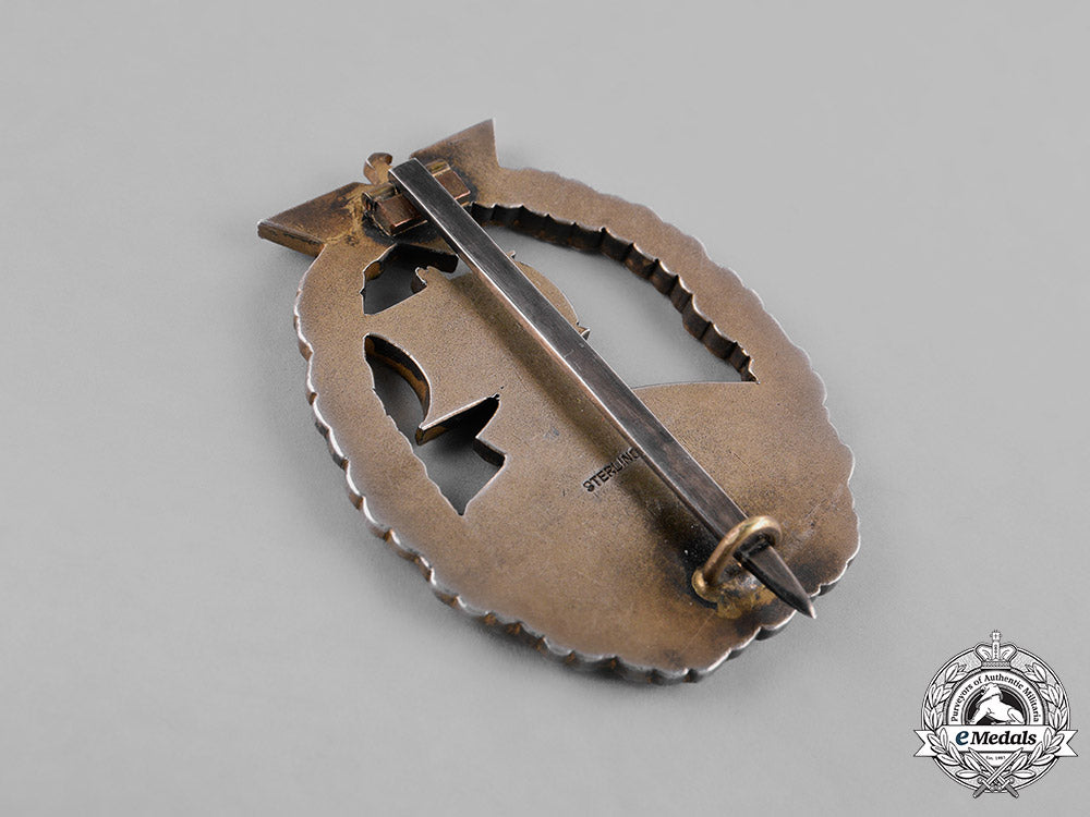 germany,_kriegsmarine._a_japanese-_made_auxiliary_cruiser_badge_of_oberbootsmann_karlheinz_cares_m181_7248