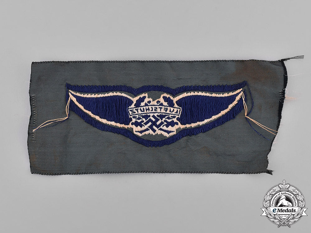 germany,_third_reich._a_group_of_second_war_period_uniform_insignia_m181_7922