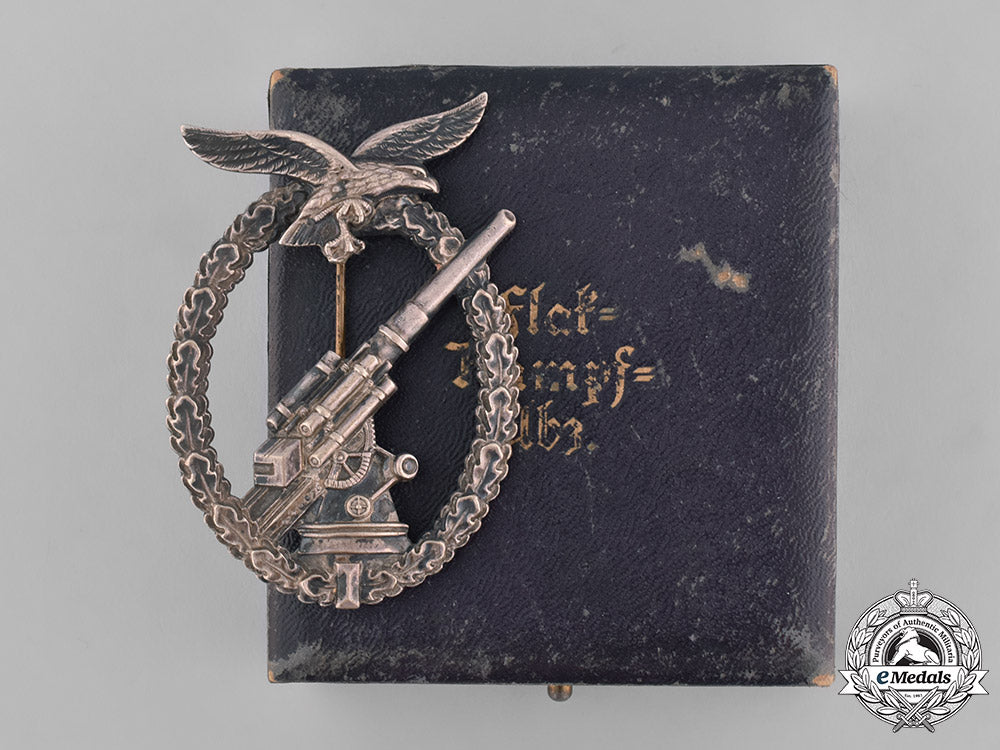 germany,_luftwaffe._a_denazified_luftwaffe_flak_badge_and_presentation_case_belonging_to_unteroffizier_barkau_m181_8158