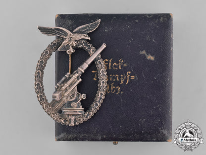 germany,_luftwaffe._a_denazified_luftwaffe_flak_badge_and_presentation_case_belonging_to_unteroffizier_barkau_m181_8158
