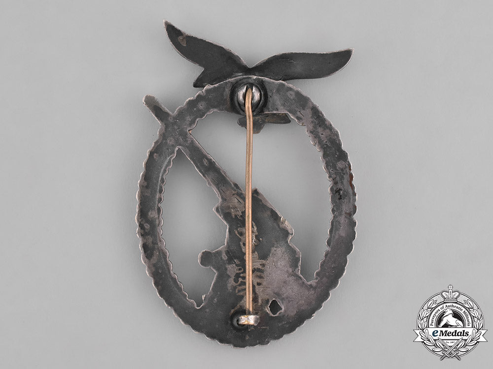 germany,_luftwaffe._a_denazified_luftwaffe_flak_badge_and_presentation_case_belonging_to_unteroffizier_barkau_m181_8160