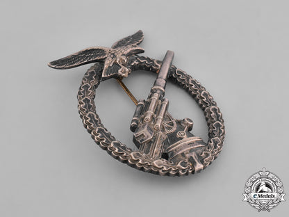 germany,_luftwaffe._a_denazified_luftwaffe_flak_badge_and_presentation_case_belonging_to_unteroffizier_barkau_m181_8161